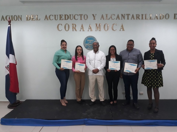 Colaboradores Reconocidos junto al Director General de CORAAMOCA Dr. Rafael E. Martínez